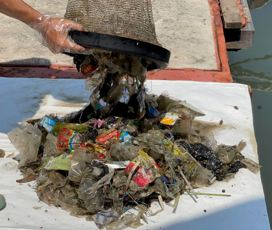 Emptying Seabin Rubbish